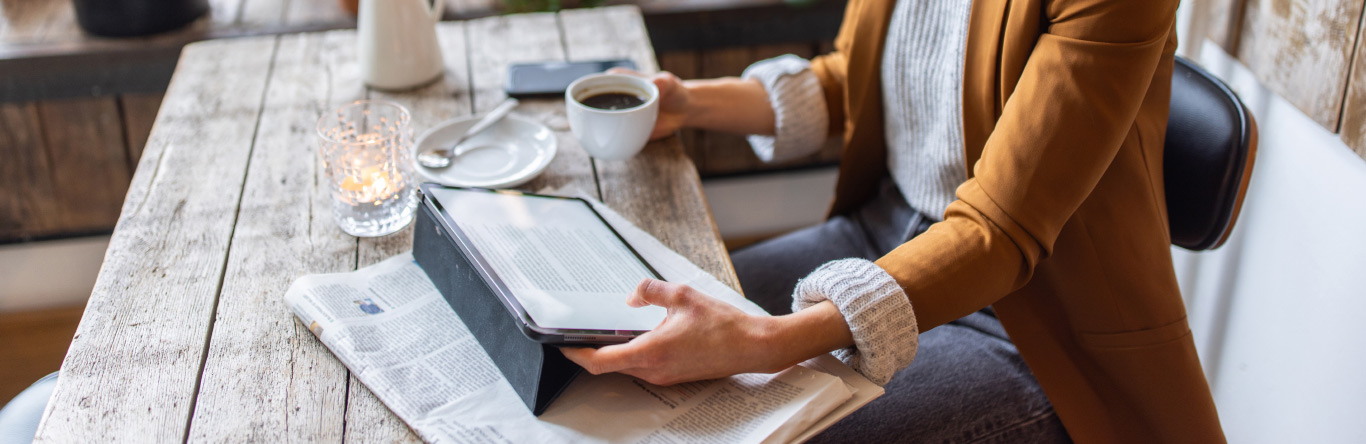 woman scrolling through real source app